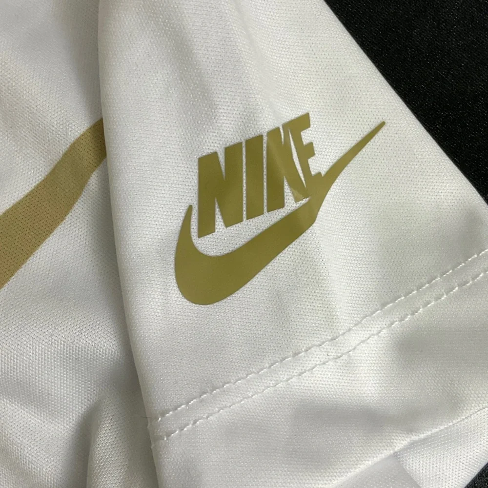 Nike Kids White and Gold Short Sleeve Tee